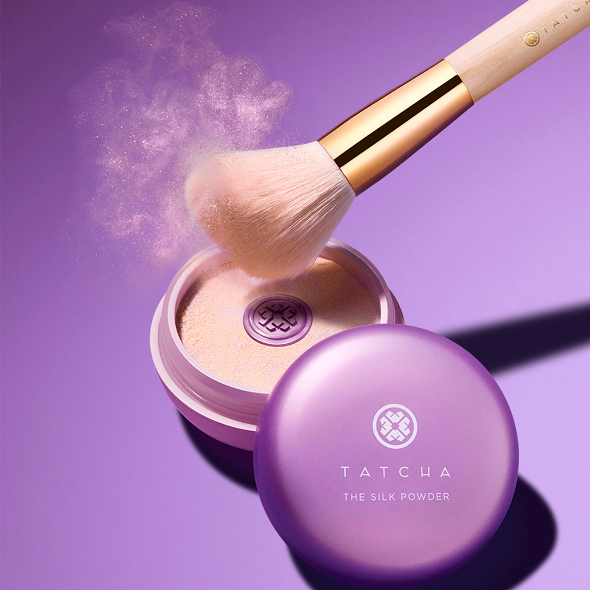 The Powder Brush shown using The Silk Powder for application.