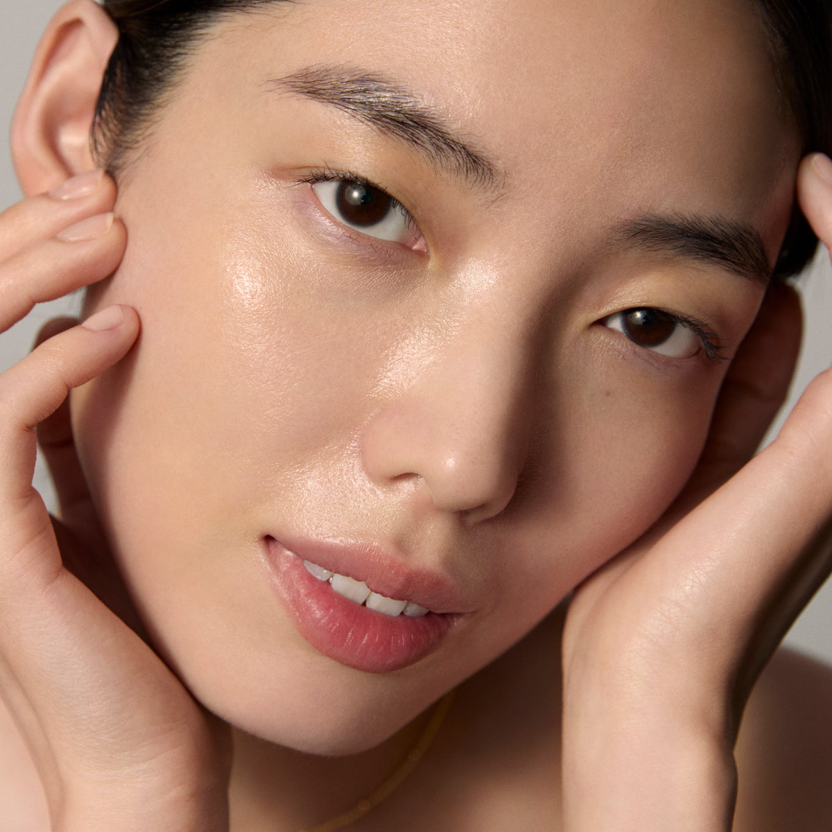 Model skin finish after using the Tatcha Brightening Serum