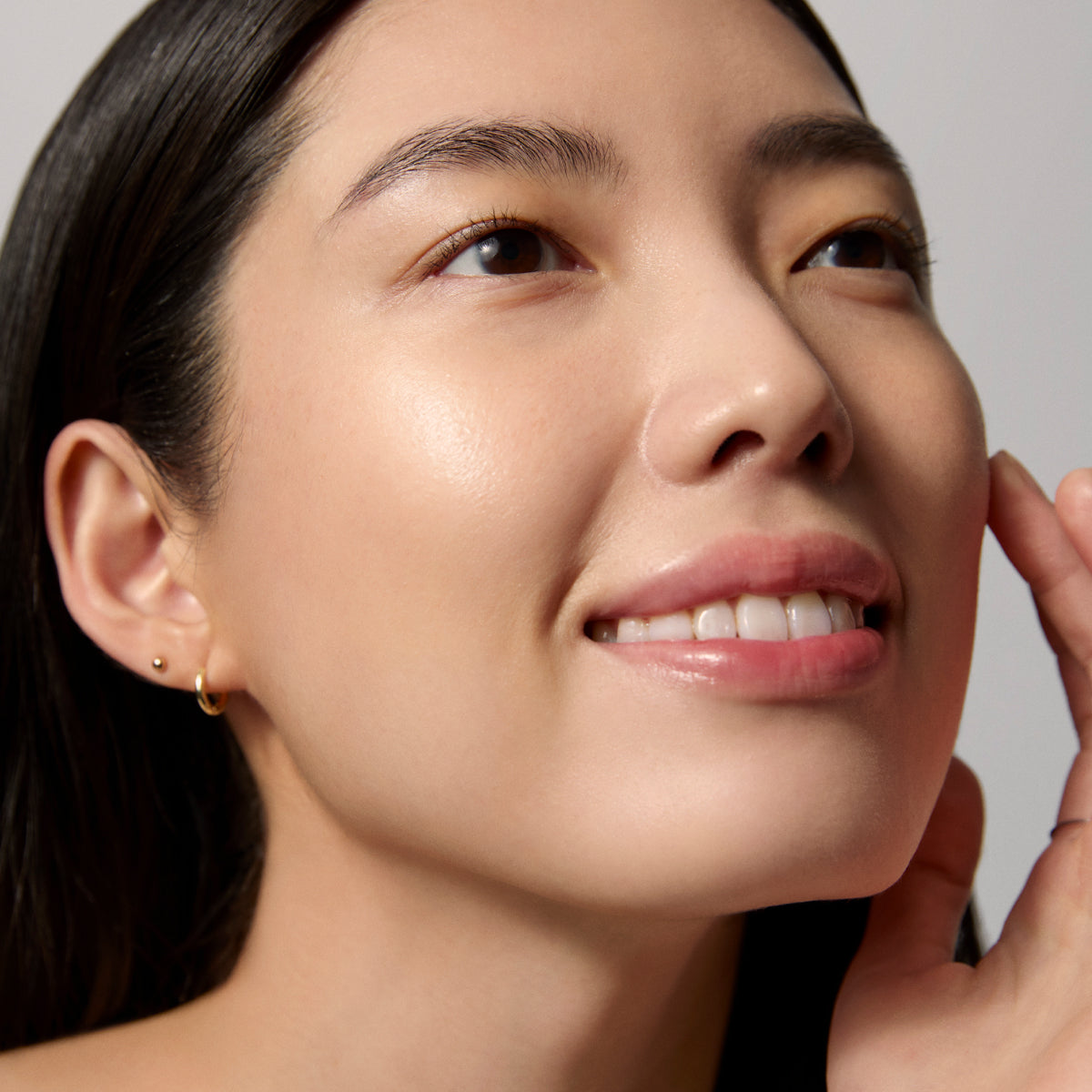 Model skin finish after using the Tatcha Dewy Milk Moisturizer