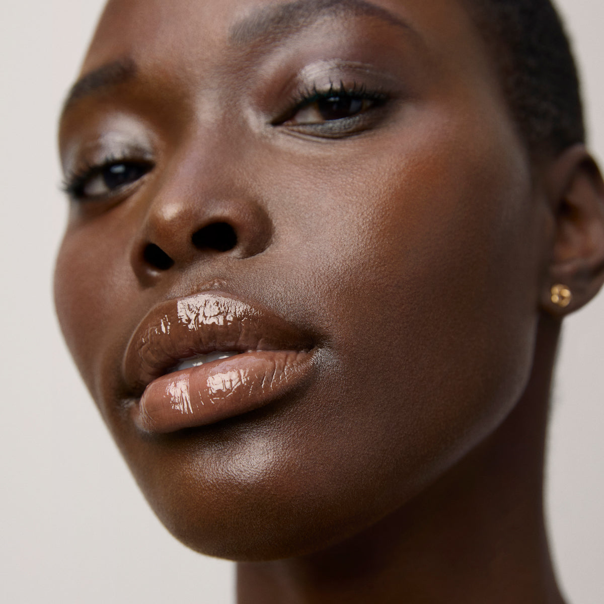 Model skin/lip finish after using the Tatcha Kissu Lip Mask
